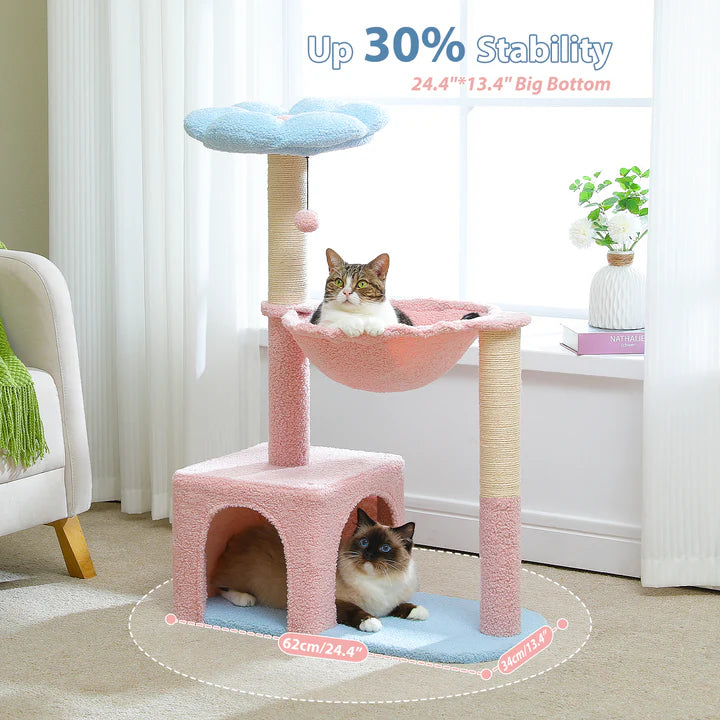 pawz road Pink and beige cat tree with two cats inside, in a room setting.