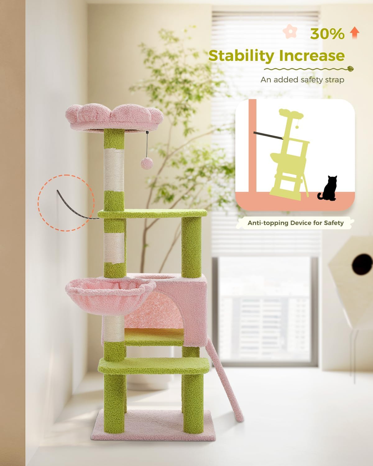 Green and pink cat tree with stability increase feature and safety strap.