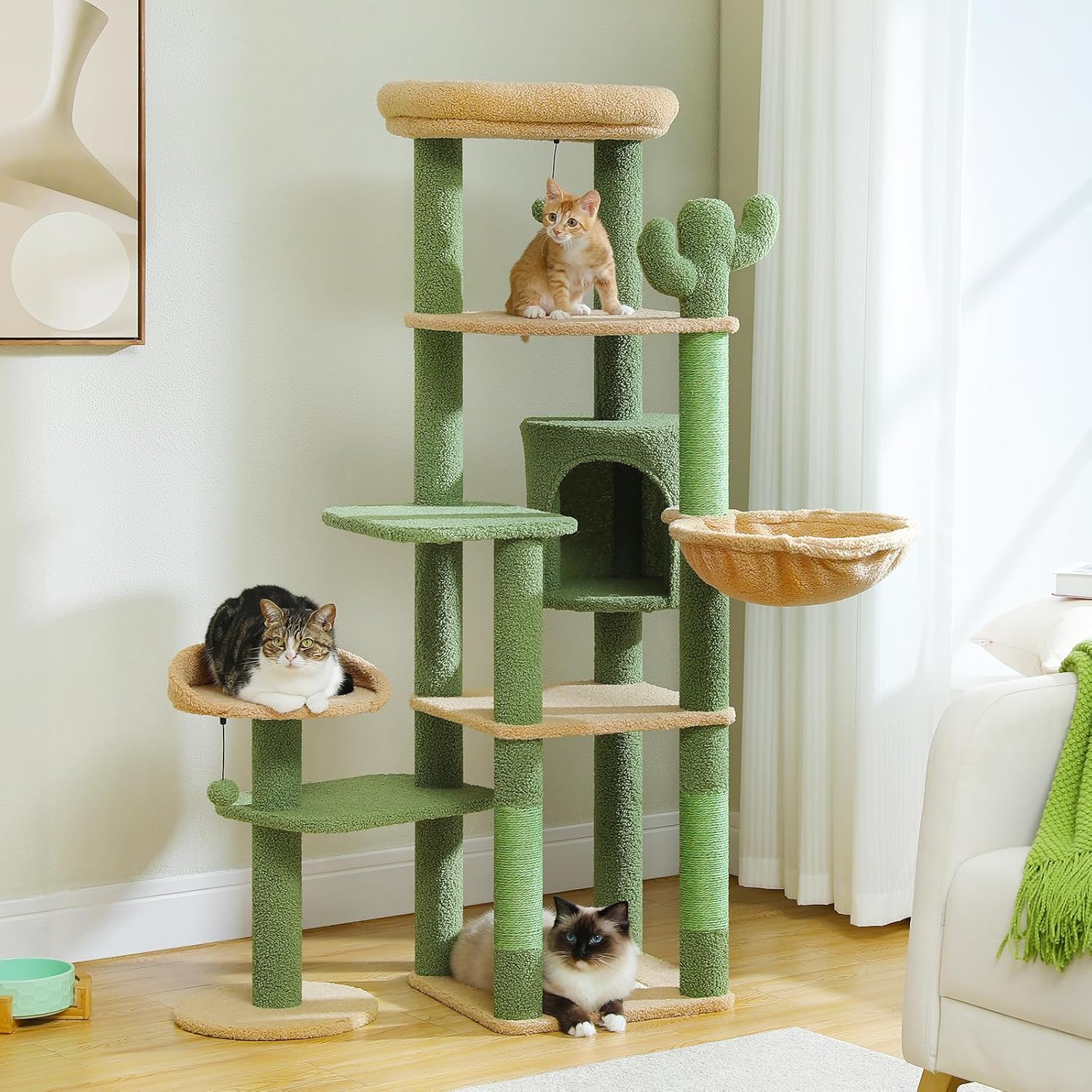 Cat tree with multiple levels and a basket, with cats on different levels.